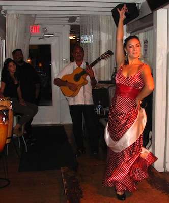Flamenco dancer Sara Jerez performing Sevillanas accompanied by guitarist Miguelito