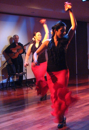 Flamenco guitarist Torcuato Zamora with dancers Sylvia and Karina in fandangos de Huelva